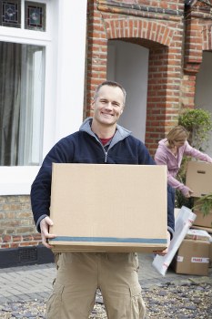 Packed boxes and furniture ready for local transport