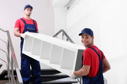 Loading furniture into a van for Dollishill customers