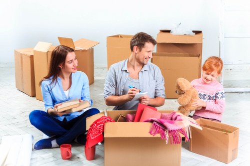 Local home moving service in Dollishill with packed boxes and removal van