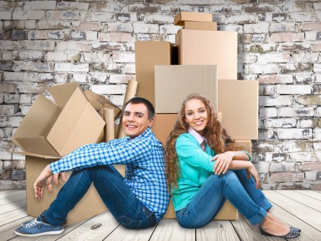 Professional packers preparing fragile household items in Dollishill