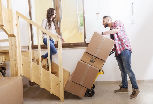 Removal van and moving crew serving Dollishill customers
