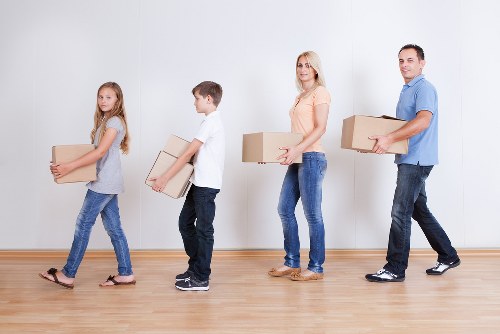Packing and loading belongings for home removals in Dollishill
